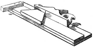 Fig. 325.—Use of Plane and Shooting Board for Mitreing.