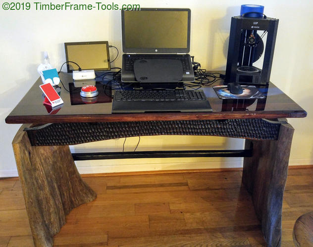 river top desk covered by computer