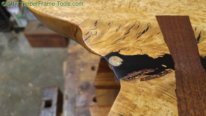 Pebble in epoxy in oak slab coffee table