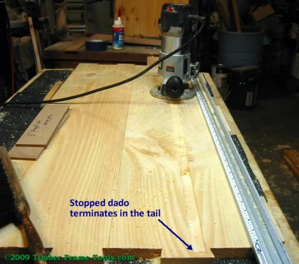 Routing the stopped dado that terminates in the tails.